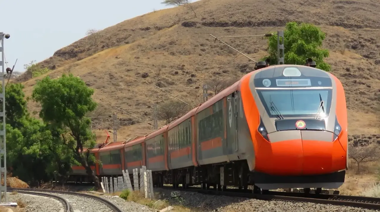 Vande Bharat train running through hills near Hubballi