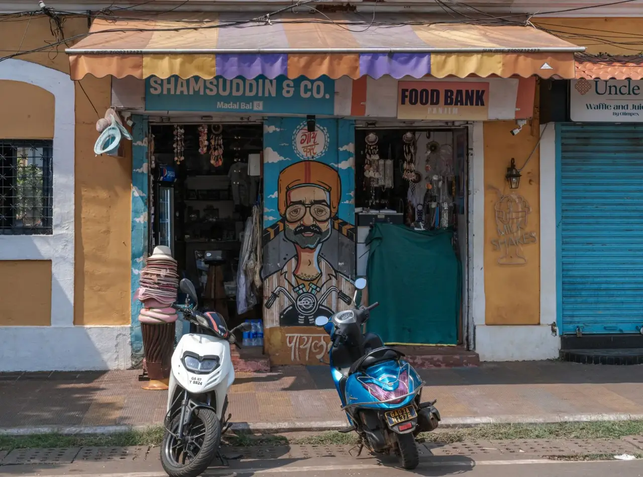 Painted shopfronts on a street in Panaji, North Goa